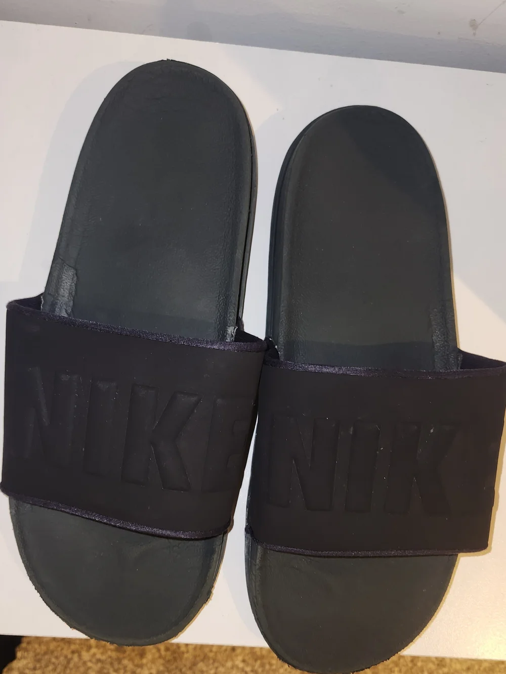Nike Black Slide Sandals with Embossed Logo
